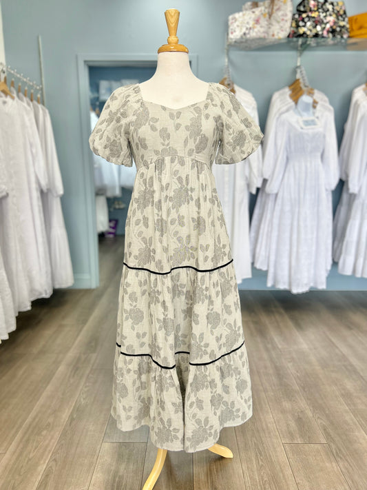 Long dress with gray floral print.