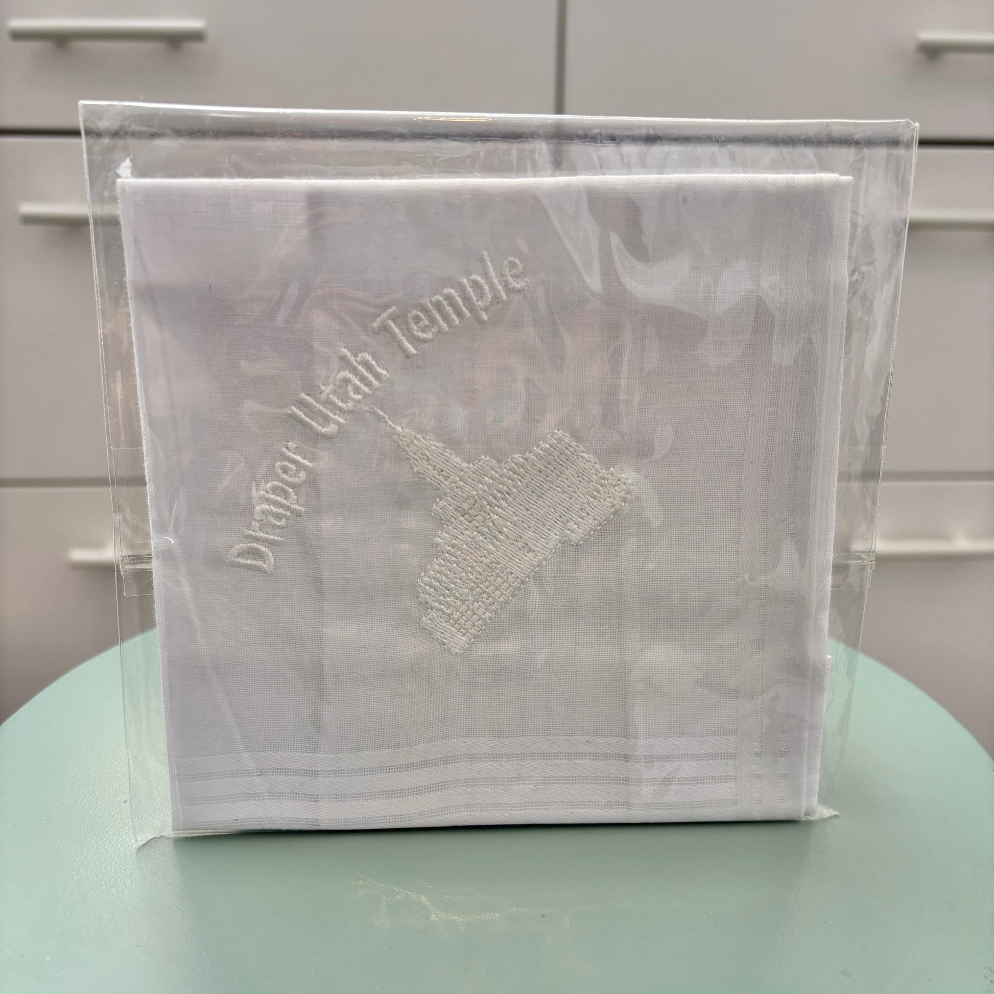 White hankie with embroidery.