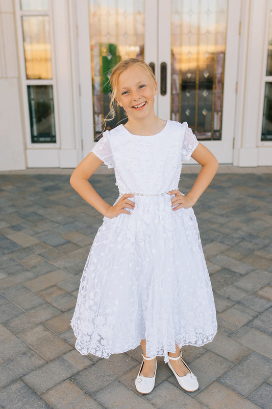 girl in white lace dress
