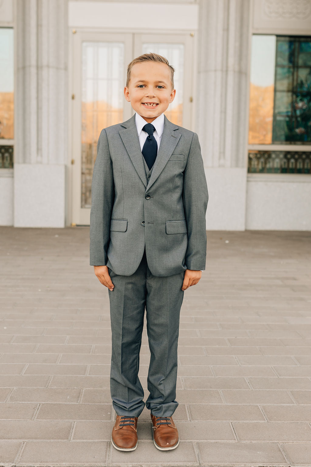 boy in charcoal suit