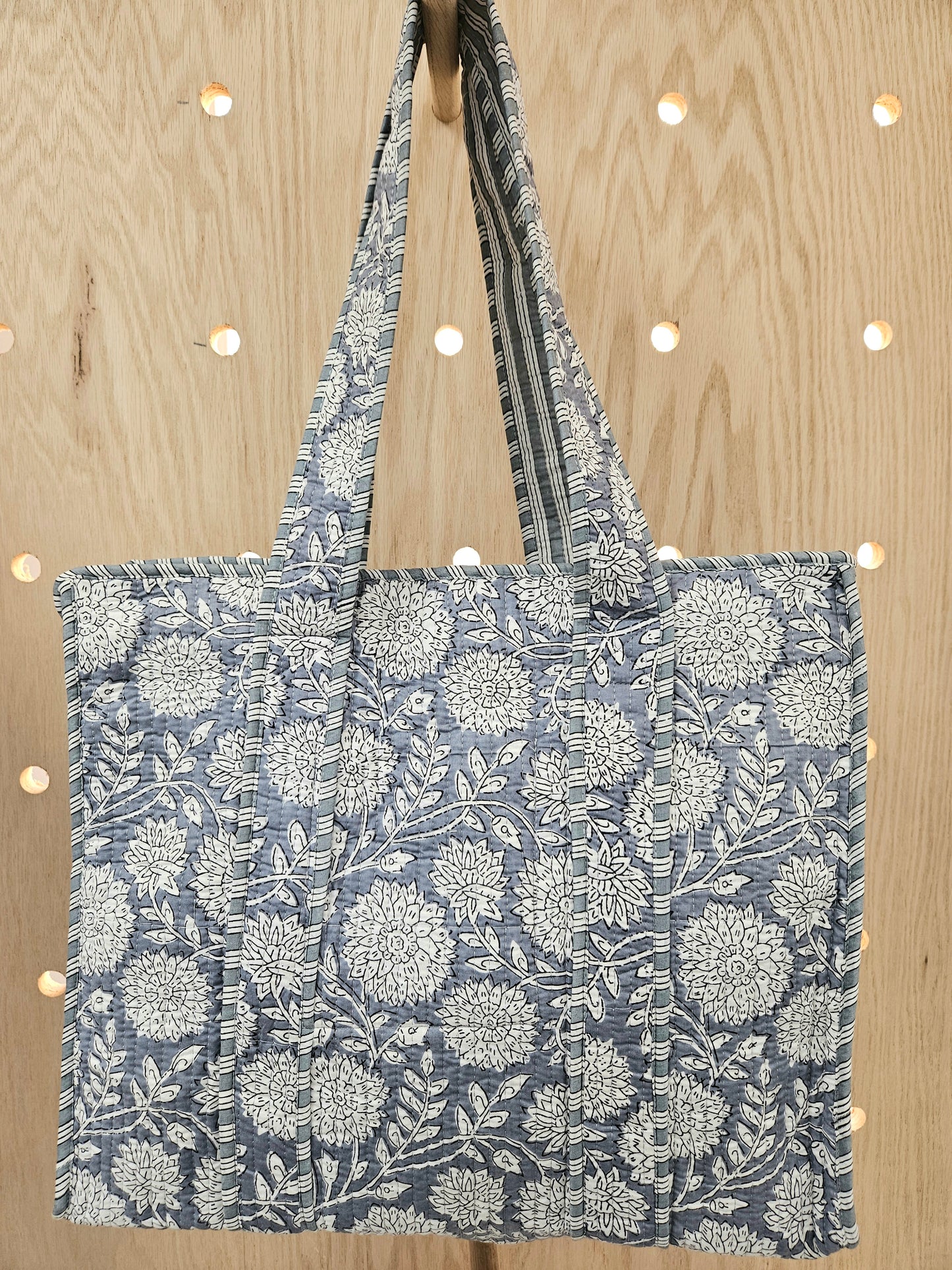 denim quilted bag hanging