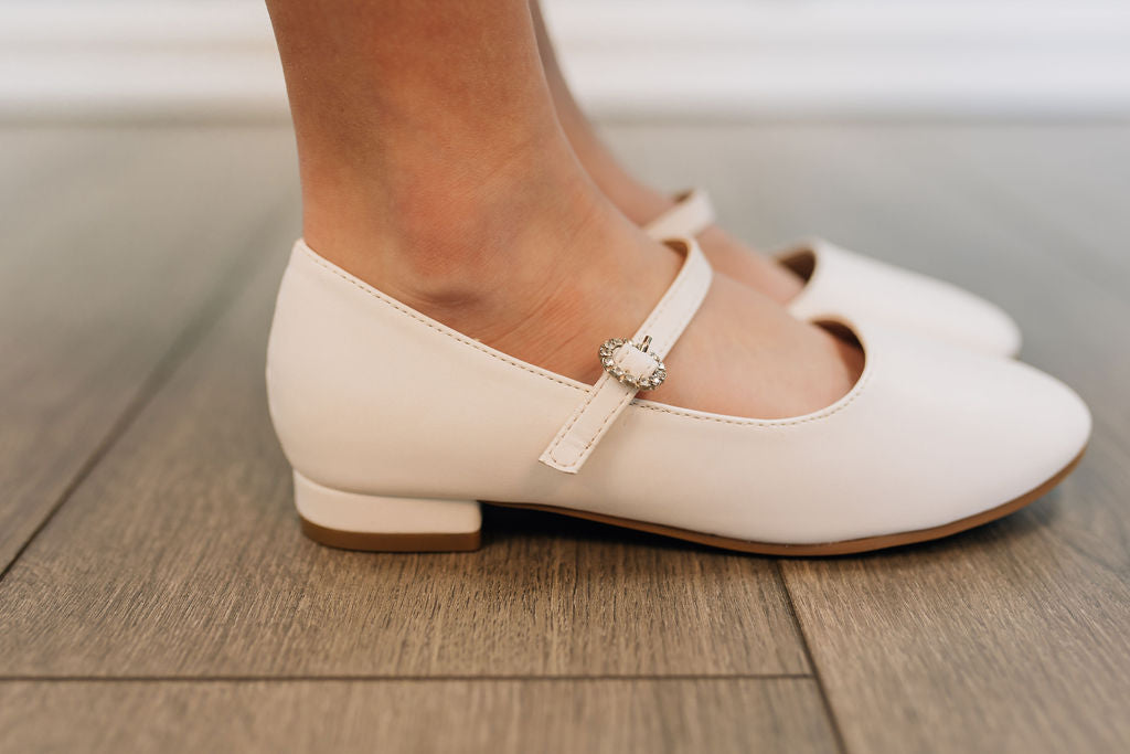girls white flats with strap