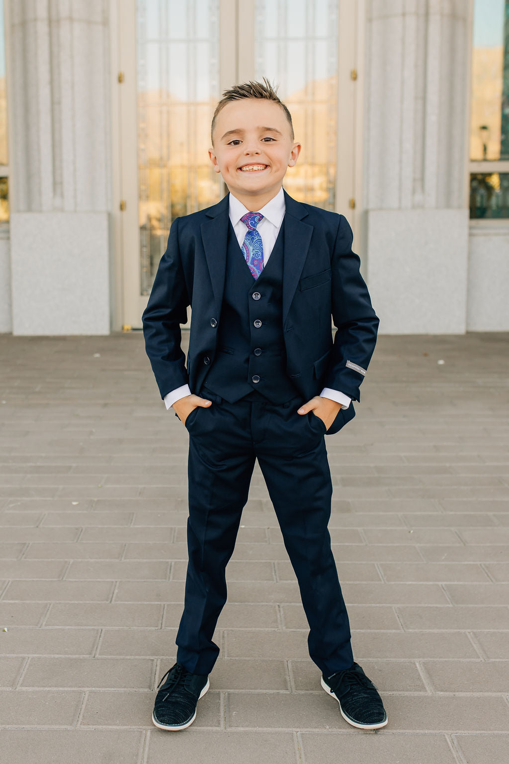 boy in navy suit with matching vest