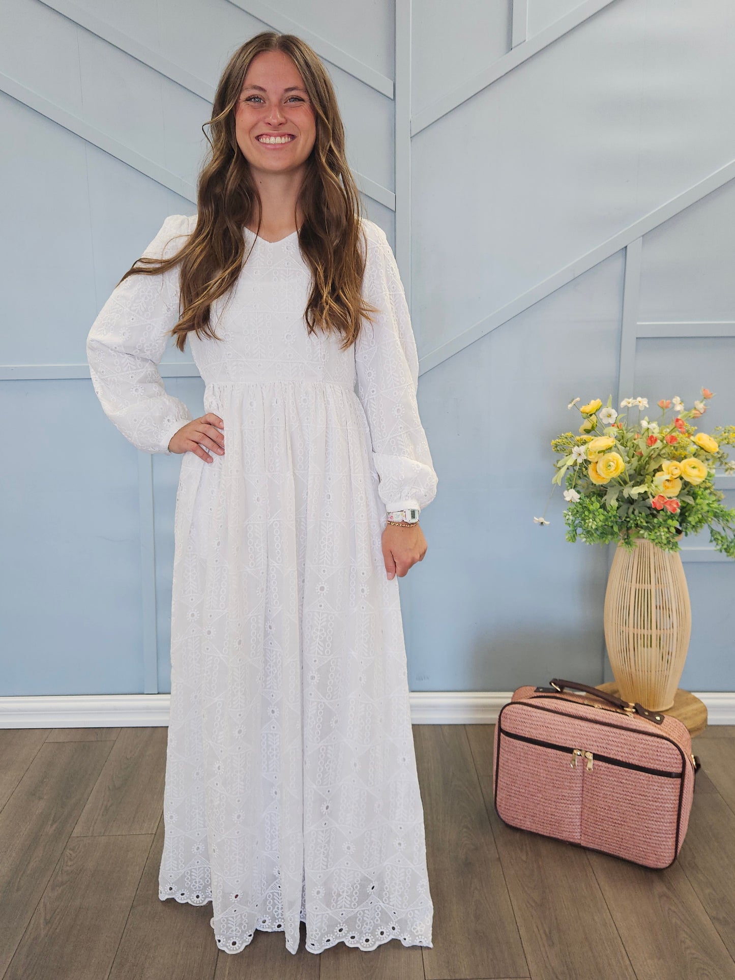 White eyelet dress with V-neck.