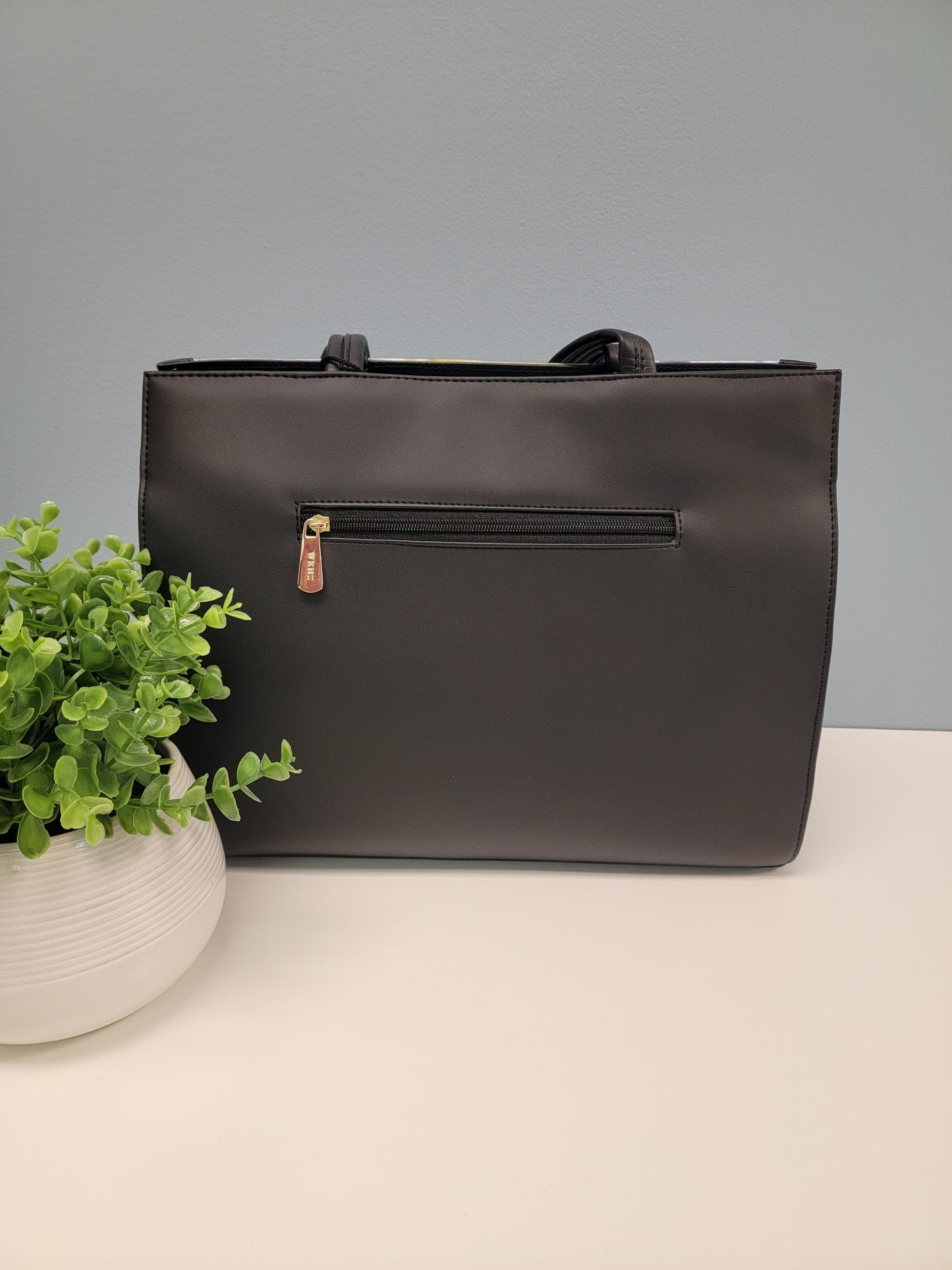 Black floral print bag