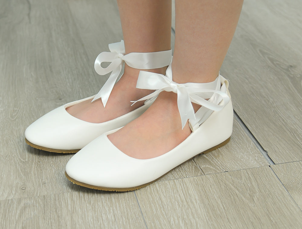 white ballerina flats with ribbon tie